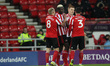 . Sunderland's Dylan McGeouch, Benji Kimpioka and Bryan Oviedo congratulate Duncan Watmore...