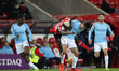 . Benji Kimpioka of Sunderland battles for possession with Iker Pozo of Manchester City du...