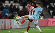 Adam Matthews of Sunderland and Benjamn Garr in action during the Checkatrade Trophy Quart...