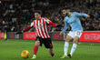  Benjamn Garr of Manchester City and Adam Matthews of Sunderland in action during the Chec...