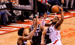  Serge Ibaka #9 of the Toronto Raptors dunk over during the Toronto Raptors vs Sacramento...