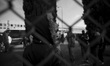 Italy, Rome: (EDITOR'S NOTE: IMAGE HAS BEEN CONVERTED TO BLACK AND WHITE) Migrants wait to...