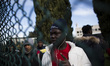 Italy, Rome: A migrants speaks to the press as he waits  to leave Castelnuovo di Porto mig...