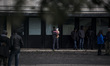 Italy, Rome: Migrants wait to leave Castelnuovo di Porto migrants center, some 10 kilomete...