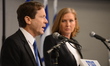 Leader of the Israeli "Hatnua" party Tzipi Livni (R) and leader of the Labour party Isaac...