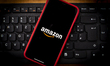 The Amazon logo is seen on a mobile phone in this photo illustration on January 29, 2019....