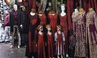 A stand with traditional dresses for sales, seen on the shopping street in the Old Town of...