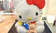 Hello Kitty figurine studded with a total of 19,636 Swarovski crystals, during Swarovski's...