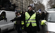 Yellow vest demonstrators attends the 'Act XII' demonstration (the 12th consecutive nation...