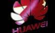 The Chinese flag is seen together with the Huawei logo superimposed in this double exposur...