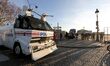 A water cannon waits in front the French National Assembly during a  'Day of strikes' by t...