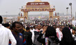 Devotees throng in the entrance gate during 88th session of Srimanta Sankardev Sangha Adhi...