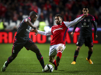 Benfica's forward Ola John (L) vies with Braga's midfielder Rafa Silva during the Portuguese Cup football match between SL Benfica and SC Br...