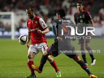 Braga's midfielder Ruben Micael (L) vies for the ball with Benfica's midfielder Enzo Perez (R)  during the Portuguese Cup football match bet...