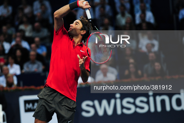 Roger Federer jumps for a smash volley during the semi final of the Swiss Indoors  at St. Jakobshalle in Basel, Switzerland on October 25, 2...