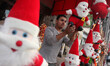 A Palestinian  vendor sells  Santa Claus dolls in Gaza City on December 24, 2014. as Chris...
