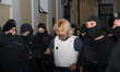 The Greek Top-Terrorist Christodoulos Xiros is escorted by anti-terrorism police officers...