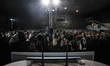 Supporters and media wait for Greek PM Antonis Samaras speech during his pre-election camp...