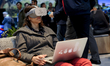 Congress attendant experiencing a VR at BMW pavilion, during the Mobile World Congress, on...