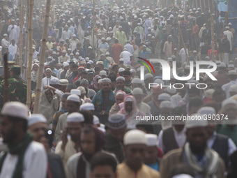 Thousands of Muslims attend the Friday prayer in the streets close to the congregration ground during the first day of the three-day long Mu...