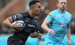 Zach Kibirige of Newcastle breaks through the Worcester defence to score their 1st try dur...