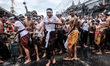 People in Jimbaran Village, Bali held a Siat Yeh (water war) ritual to celebrate the new y...