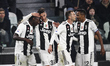 Juventus forward Moise Kean (18) celebrates with his teammates after scoring his goal duri...