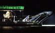 SpaceX's unmanned Crew Dragon capsule (at left) is carried on the Go Searcher recovery shi...