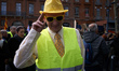 A Yellow Vest protester in tuxedo. For the Act 17 several thousands of protesters called '...