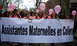 Maternal assistants in a rose vest demonstrated with yellow vests. The banner reads 'Angry...