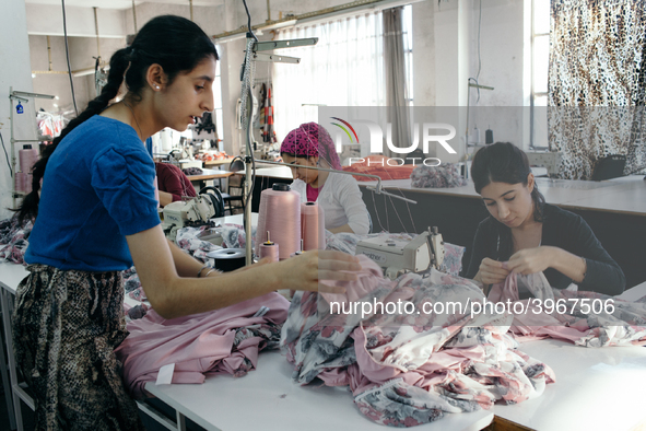 Workers in a small garment factory in the Kurtulus neighborhood of Istanbul.  