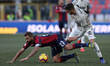 Danilo Laranceira of Bologna FC 1909 and Rodrigo Bentancur of Juventus FC battle for the b...