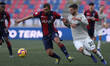 Danilo Laranceira of Bologna FC 1909 and Rodrigo Bentancur of Juventus FC battle for the b...