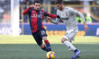 Nicola Sansone of Bologna FC 1909 and Rodrigo Bentancur of Juventus FC battle for the ball...