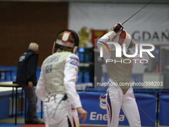 Gdansk, Poland 17th, Jan. 2015 Artus Court 2015 fencing cup in Gdansk. Ysoara Thibus from France fights against Eva Hampel from Germany. (