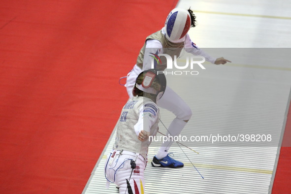 Gdansk, Poland 17th, Jan. 2015 Artus Court 2015 fencing cup in Gdansk. Ysoara Thibus from France fights against Eva Hampel from Germany. 