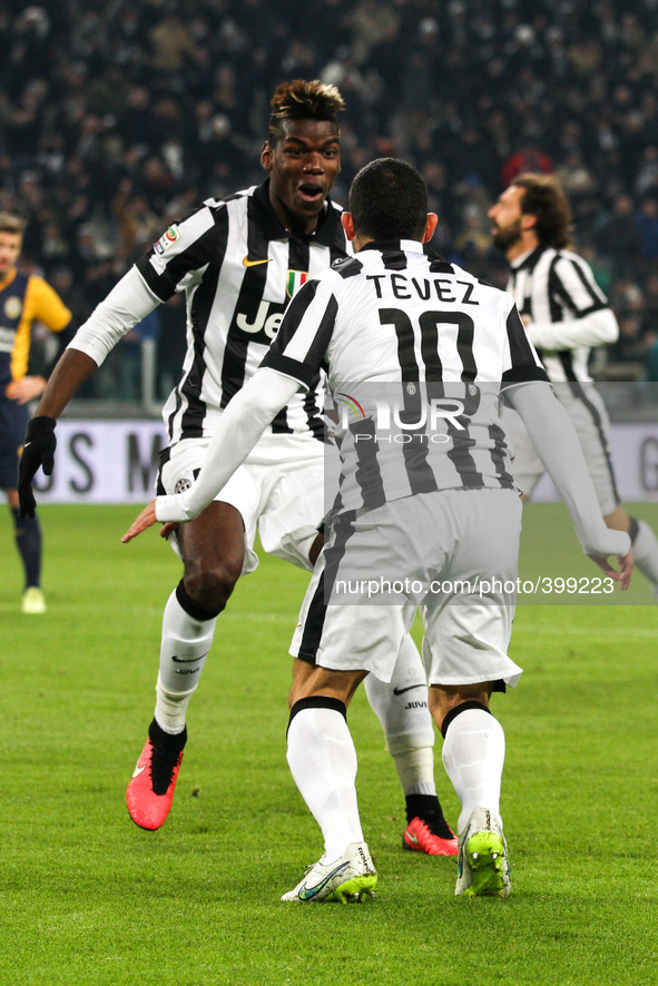 Juventus forward Carlos Tevez (10) celebrates with Juventus midfielder Paul Pogba (6) after scoring his goal during the Serie A football mat...