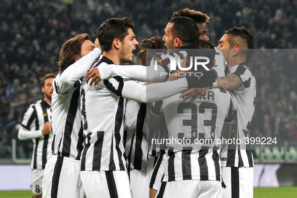 Juventus forward Carlos Tevez (10) celebrates with his teammates after scoring his goal during the Serie A football match n.19 JUVENTUS - HE...