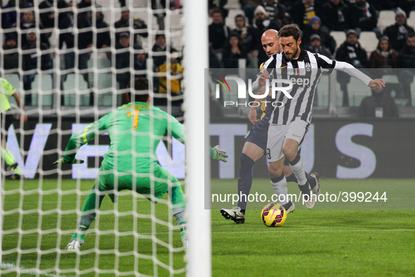Juventus midfielder Claudio Marchisio (8) shoots for goal during the Serie A football match n.19 JUVENTUS - HELLAS VERONA on 18/01/15 at the...