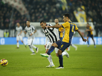  Carlos Tevez and Rafael Marqueznduring the Serie A match between Juventus FC and Hellas Verona FC at Juventus Stafium  on january 18, 2015...