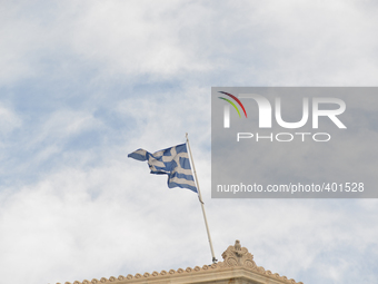 Greek flag on top of the Athenian Parliament. Athens 20 January 2015.(