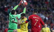 Ukraine's goalkeeper Andriy Pyatov vies with Portugal's forward Cristiano Ronaldo during t...