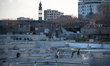 On 22 March, construction workers built new homes in the historic Sur district of Diyarbak...