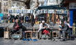 On March 22, 2019, shoe shiners work in the streets of the historic Sur district of Diyarb...