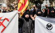 Protesters screaming in the antifascist concentration  during a Vox party rally in Barcelo...