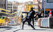 A protesters throws a bottle to the police  during a Vox party rally in Barcelona, Spain,...