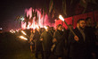 Participants hold a torches during Pilgrimage of members of polish nationalistic movement...