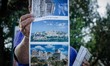 A woman is pictured  selling pictures outside the museum of Acropolis in Athens , 9 April...