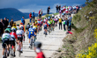 The peloton cross some sterrato zones during the second stage of 59th Itzulia-Vuelta Cicli...