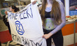 Extinction Rebellion eco activists holds a banner during interruption of Water Expo confer...